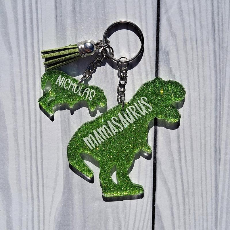 http://vinylabundance.com/cdn/shop/products/Mamasaurus-Glitter-Keychain-with-Personalized-Mini-Charms_f5b4656f-0e12-423d-9bac-53c3080f3401.jpg?v=1686890076