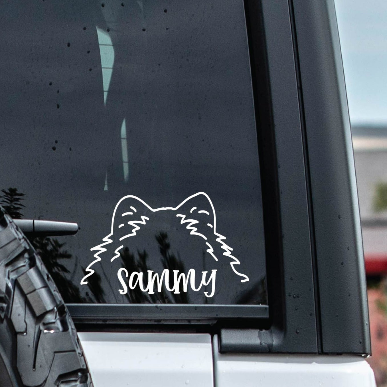 pomeranian dog ear outline in white adhesive vinyl 